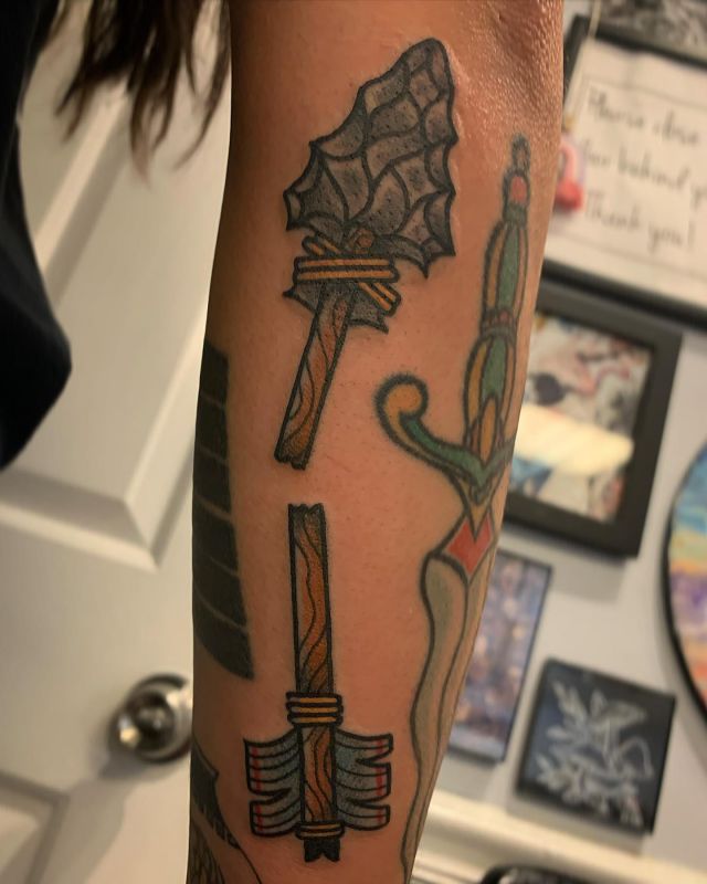 Unique Broken Arrow Tattoo on Forearm