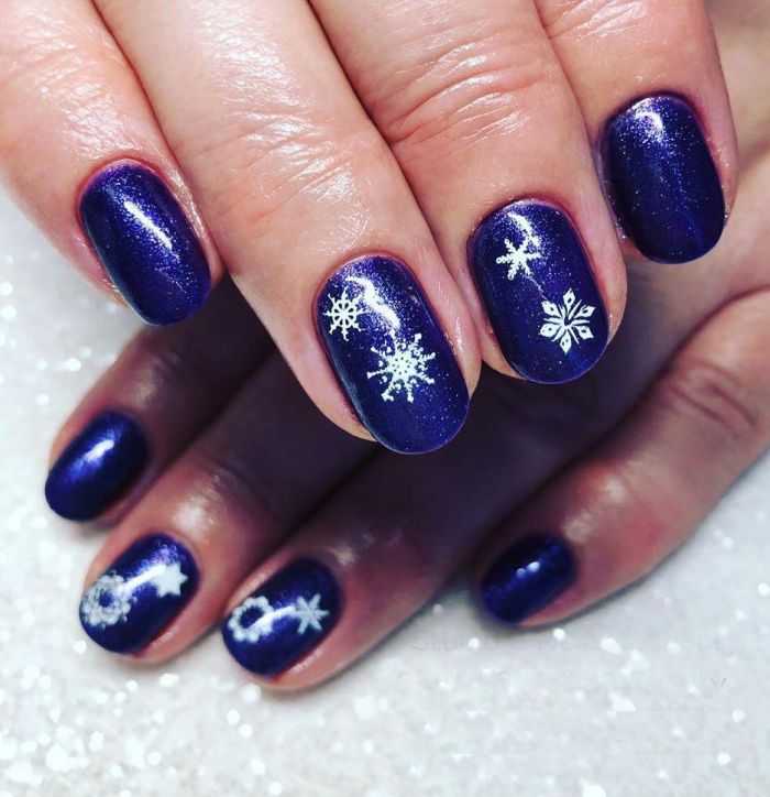 Rounded Blue Christmas Nail with Snowflake