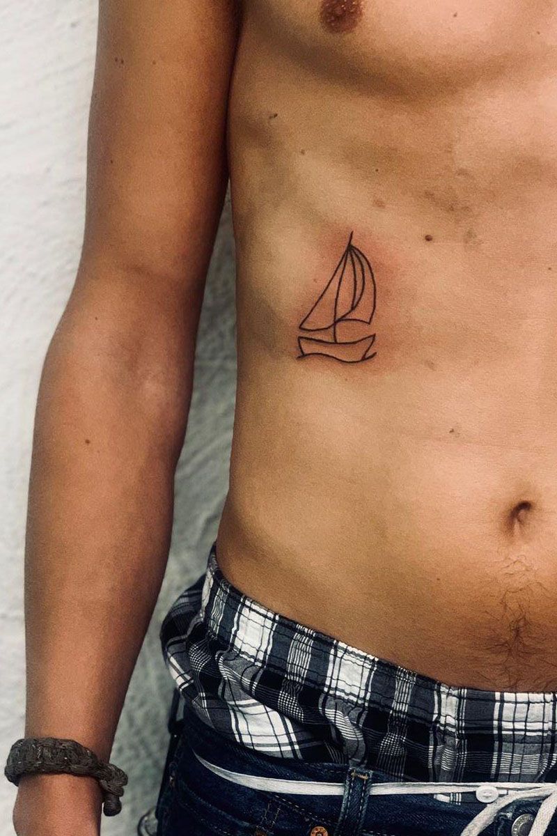 sailboat hand tattoo